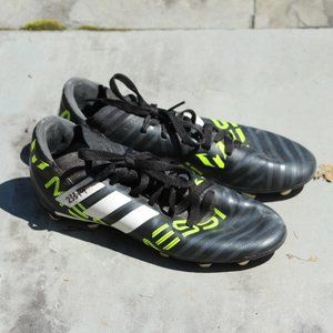 Neon green and black soccer cleats